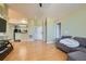 Spacious open-concept floorplan featuring hardwood floors and light green walls at 1342 Orchard Park Dr, Stone Mountain, GA 30083