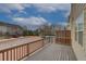 Spacious deck with wood railings, perfect for outdoor entertaining, overlooking a well-maintained street at 2203 Fullers Aly, Kennesaw, GA 30144