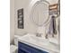 Stylish bathroom with a modern sink, elegant mirror, and charming decor creates a serene and inviting space at 2203 Fullers Aly, Kennesaw, GA 30144