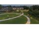 Community green space and walking paths illuminated by evening lights at 2203 Fullers Aly, Kennesaw, GA 30144