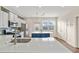 Modern kitchen featuring white cabinets, stainless steel appliances, and a center island for efficient and stylish cooking at 2203 Fullers Aly, Kennesaw, GA 30144