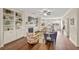 Inviting living room boasts hardwood floors, a cozy fireplace, and built-in shelving for stylish storage and decor at 2203 Fullers Aly, Kennesaw, GA 30144