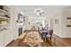 Charming living room features a fireplace, built-in shelving, and hardwood floors for a warm and inviting space at 2203 Fullers Aly, Kennesaw, GA 30144