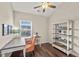 Office space with a vaulted ceiling, hardwood floors, and bright window at 2203 Fullers Aly, Kennesaw, GA 30144