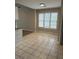 Bright breakfast nook featuring tile flooring and natural light from large windows at 2904 Pleasant Ridge Dr, Decatur, GA 30034