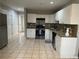 Spacious kitchen with ample counter space, white cabinets, and modern appliances at 2904 Pleasant Ridge Dr, Decatur, GA 30034
