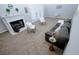 Spacious living area featuring a fireplace, high ceilings, and cozy carpeting at 2904 Pleasant Ridge Dr, Decatur, GA 30034