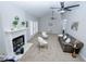 Open-concept living room featuring a fireplace, neutral carpet, and ample space for entertaining at 2904 Pleasant Ridge Dr, Decatur, GA 30034