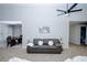 Comfortable living room showcasing neutral walls, plush carpet, and access to the dining area at 2904 Pleasant Ridge Dr, Decatur, GA 30034