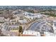 Extensive aerial shot showing many businesses, apartments, and housing at 3831 Portland Trail Dr, Suwanee, GA 30024