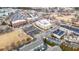 Aerial view of neighborhood with commercial space and a park at 3831 Portland Trail Dr, Suwanee, GA 30024