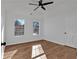 Bright bedroom with ceiling fan and natural light at 473 Silverleaf Ln, Dallas, GA 30157
