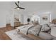 Spacious bedroom boasts neutral tones, a ceiling fan, and a comfortable atmosphere at 473 Silverleaf Ln, Dallas, GA 30157
