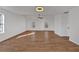 A spacious bonus room with wood floors, white walls, and ample natural light at 473 Silverleaf Ln, Dallas, GA 30157