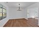 Bright dining room featuring hardwood floors and large windows for ample light at 473 Silverleaf Ln, Dallas, GA 30157