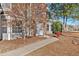 Charming two-story home featuring a stone facade, attached garage, and well-maintained landscaping at 473 Silverleaf Ln, Dallas, GA 30157