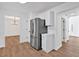 Spacious kitchen leads to the dining area in this home with stainless steel appliances at 473 Silverleaf Ln, Dallas, GA 30157