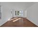 Bright living room with large windows, hardwood floors, and ample natural light at 473 Silverleaf Ln, Dallas, GA 30157