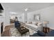 Open living room showcasing hardwood floors, fireplace, and open-concept design at 473 Silverleaf Ln, Dallas, GA 30157