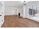 Open living area with wood floors, a fireplace and a view of nature at 473 Silverleaf Ln, Dallas, GA 30157