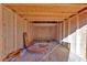 Unfinished shed interior with unfinished wood paneling walls and ceiling at 473 Silverleaf Ln, Dallas, GA 30157