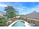 Backyard with a pool, lounge area, and lake view at 10195 Kinross Rd, Roswell, GA 30076