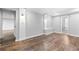 Finished basement with wood-look floors and built-in shelving at 1685 Bullard Rd, Powder Springs, GA 30127