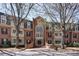 Brick building with large windows and mature trees at 25213 Plantation Ne Dr # 25213, Atlanta, GA 30324