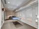 Carpeted game room with ping pong table, recessed lighting, and large windows at 25213 Plantation Ne Dr # 25213, Atlanta, GA 30324