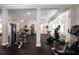 Bright fitness center with multiple machines, ceiling fans and large windows at 25213 Plantation Ne Dr # 25213, Atlanta, GA 30324