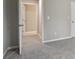 Hallway featuring neutral paint and carpet at 25213 Plantation Ne Dr # 25213, Atlanta, GA 30324
