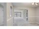 Open-concept living room showcasing fresh paint and plenty of natural light at 25213 Plantation Ne Dr # 25213, Atlanta, GA 30324