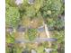 An aerial view of the property shows mature trees, lawn, and the detached garage at 2799 Old Concord Se Rd, Smyrna, GA 30082