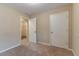 This bedroom has neutral walls, carpeted floors, closet, and walk-in closet at 1137 2Nd Nw St, Atlanta, GA 30318