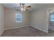 Bedroom featuring carpet, a ceiling fan, and a window with natural light at 1137 2Nd Nw St, Atlanta, GA 30318