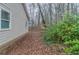 A side view of the house showing the exterior, siding, and backyard at 1137 2Nd Nw St, Atlanta, GA 30318