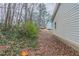 A side view of the house showing the exterior and the backyard at 1137 2Nd Nw St, Atlanta, GA 30318