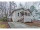 Charming single Gathering home featuring a cozy front porch and a well-maintained yard at 1137 2Nd Nw St, Atlanta, GA 30318