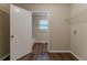 The laundry room has wood-look floors, with washer and dryer hook-ups at 1137 2Nd Nw St, Atlanta, GA 30318