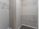 Walk-in closet with carpet and shelving units at 1137 2Nd Nw St, Atlanta, GA 30318