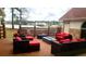 Relaxing patio with fire pit and lake view at 300 Jonesboro Rd, Mcdonough, GA 30253