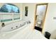 Bathroom with large garden tub and shower at 300 Jonesboro Rd, Mcdonough, GA 30253