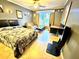 Bedroom with a comfortable bed, seating area, and a workspace at 300 Jonesboro Rd, Mcdonough, GA 30253
