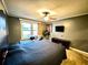 Main bedroom with a cozy sitting area and lake view at 300 Jonesboro Rd, Mcdonough, GA 30253