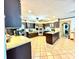 Kitchen with granite countertops and dark wood cabinets at 300 Jonesboro Rd, Mcdonough, GA 30253