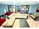 Spacious living room with sectional sofa and large windows at 300 Jonesboro Rd, Mcdonough, GA 30253