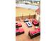 Patio with fire pit and comfortable seating area overlooking a lake at 300 Jonesboro Rd, Mcdonough, GA 30253