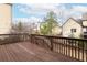 Private back deck with wooden railings provides scenic neighborhood views and outdoor enjoyment at 4335 Silent Path, Cumming, GA 30028