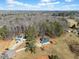 Aerial view of two homes in a wooded area at 104 Federal Path, Temple, GA 30179