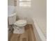 A clean bathroom includes a white toilet and tiled tub/shower at 2103 Mcafee Rd, Decatur, GA 30032